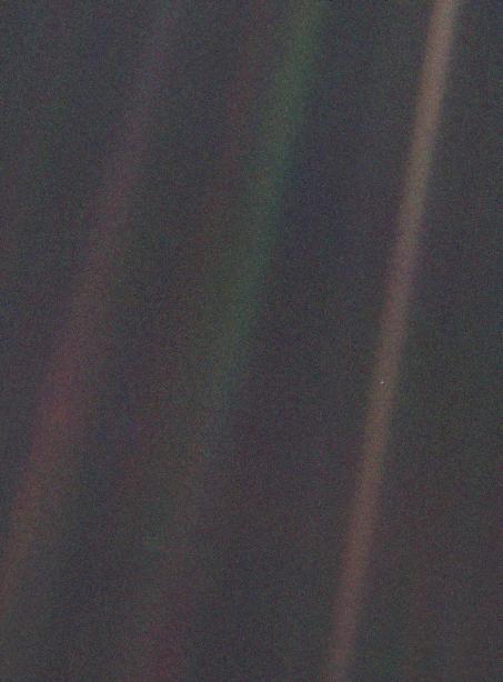 Picture of Earth, as seen from deep outer space, a single pixel in the vast cosmos